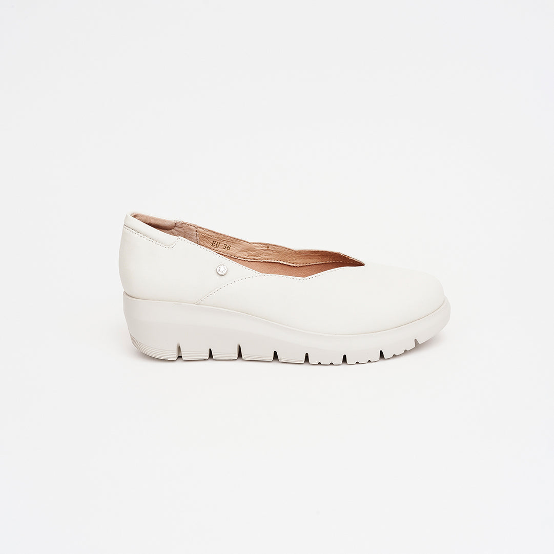 Decolletè in pelle zeppa 5 cm.