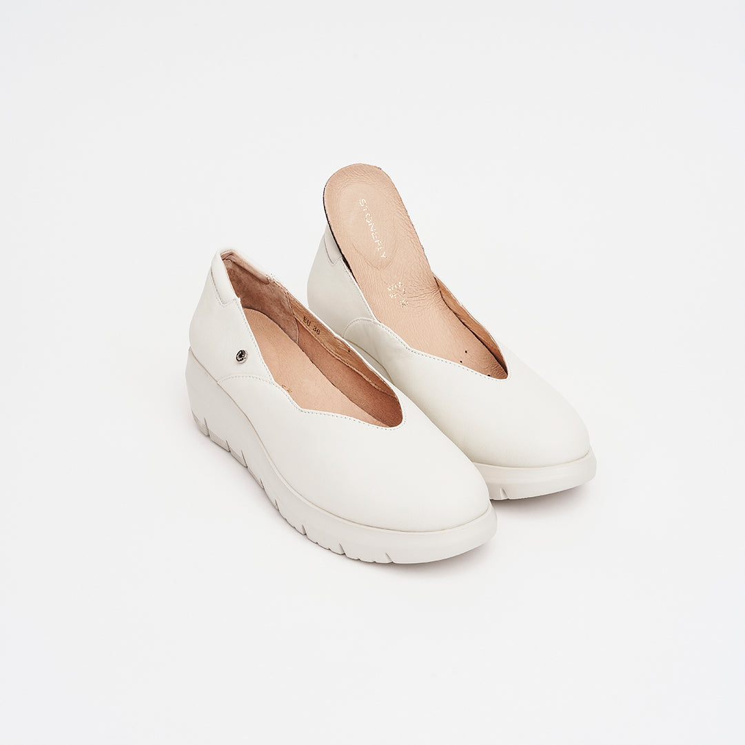 Decolletè in pelle zeppa 5 cm.